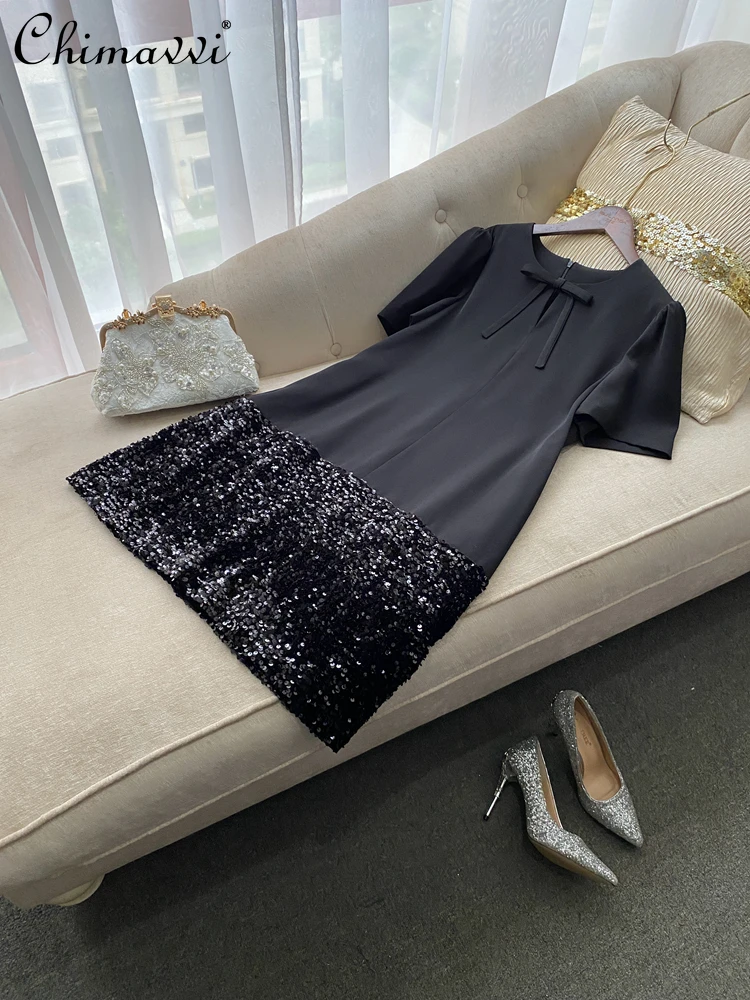 Station européenne été nouveau haut de gamme léger luxe célébrité tempérament nœud ample robe courte lourd paillettes fête robe droite