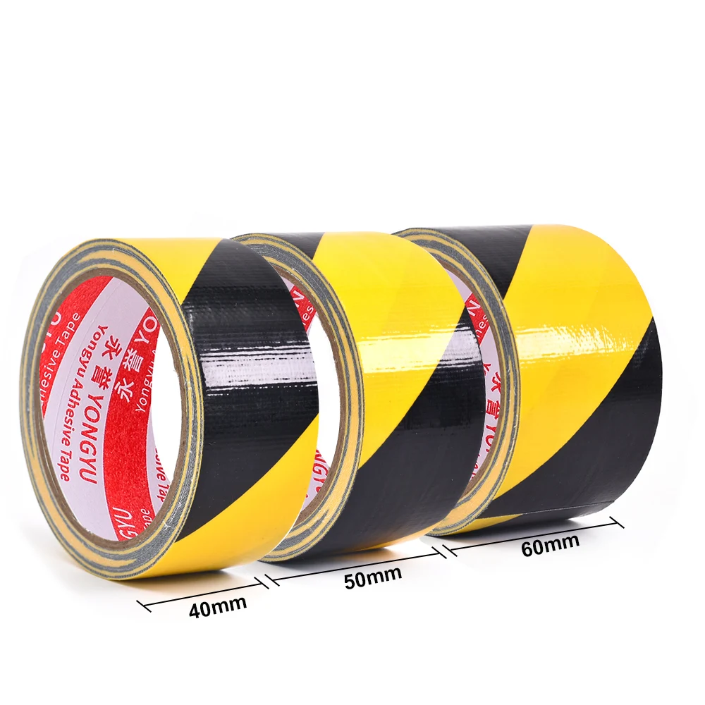 Black and yellow hazard safety warning stripe barrier tape, suitable for marking floors, walls, pipes, and equipment