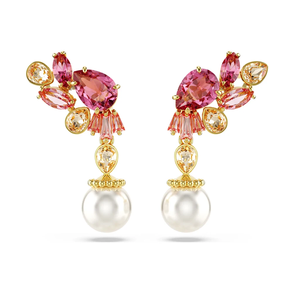 

Серьги-подвески с розовыми и персиковыми кристаллами и цветочным узором — универсальные украшения для свиданий и мероприятий