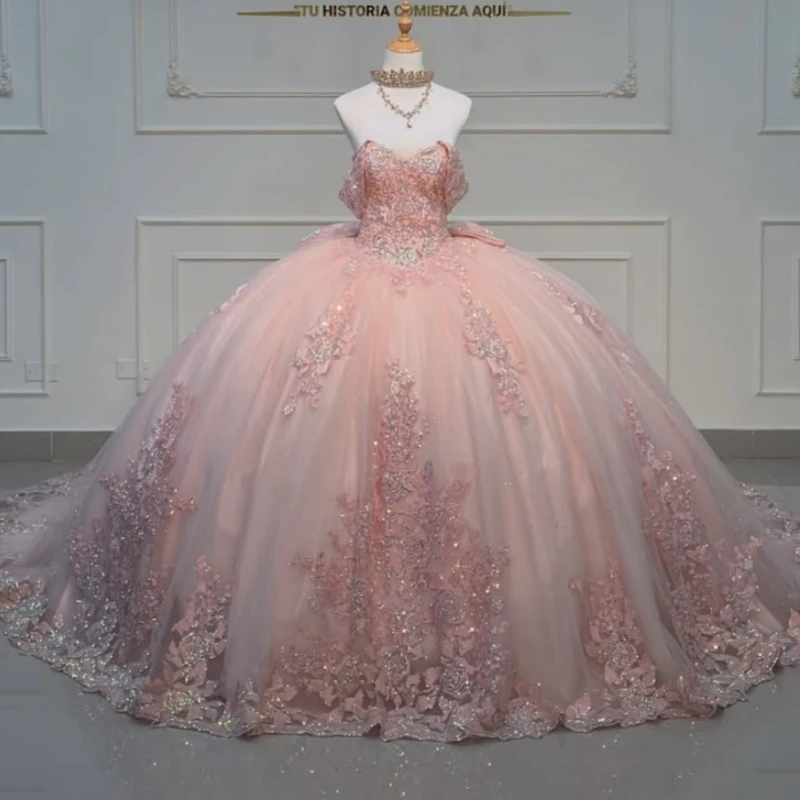 

Pink Shiny Ball Gown Quinceanera Dresses Applique Lace Beading Crystal Bow Tull Corset Off The Shoulder Sweet 16 Dress vestidos