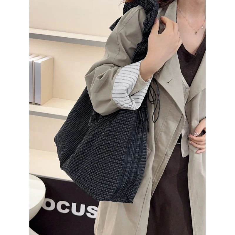 

Plaid canvas bag for women, large capacity2026New Summer Casual Pleated Single-Shoulder Crossbody Bag with a High-End Dumpling B