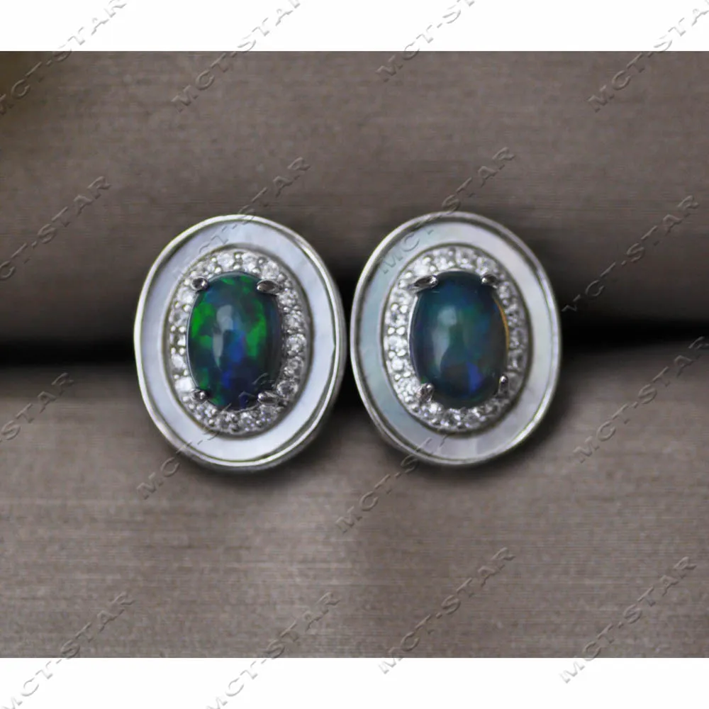 

Z14286 Серьги-гвоздики из серебра 925 пробы с натуральным павлином, черным опалом, 13 мм