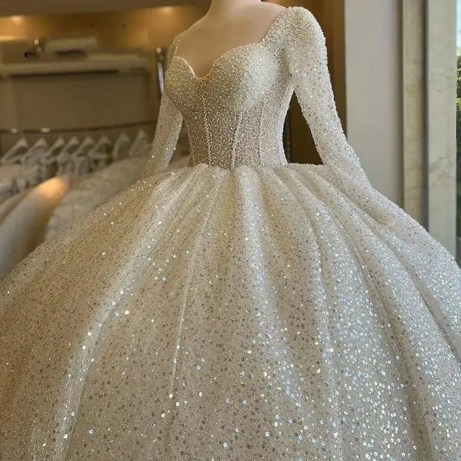 

Customized Gorgeous Square Neckline Full Pearls Puffy Wedding Gowns Court Train Illusion Long Sleeves Shinny Beads Sequins Brid