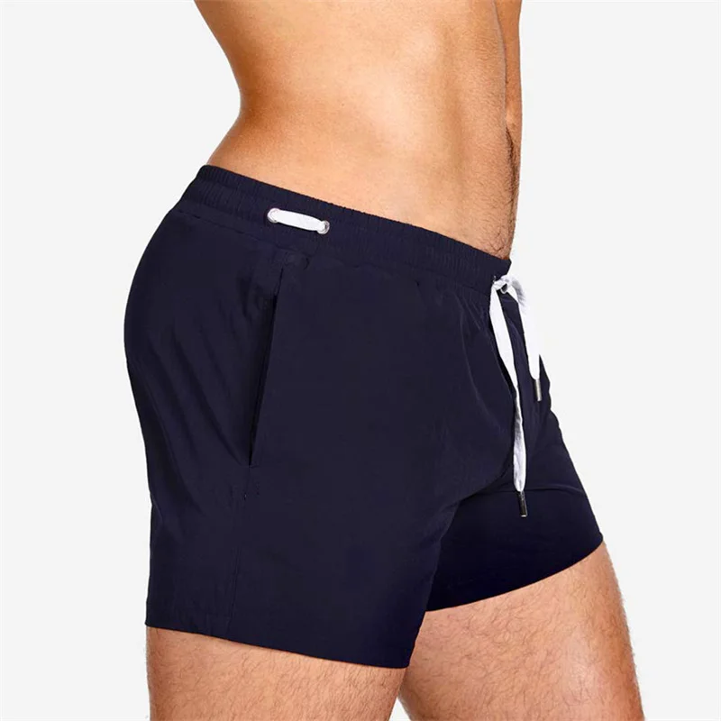 Pantalones cortos de playa con malla para hombre, bañadores de secado rápido, traje de baño para Surf, pantalones atléticos para correr y gimnasio,