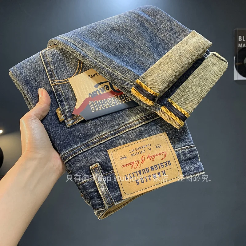 Celana Jeans klasik untuk pria, celana Denim kelas atas serbaguna tren jalanan Distressed Retro, celana pensil pria musim gugur 2024