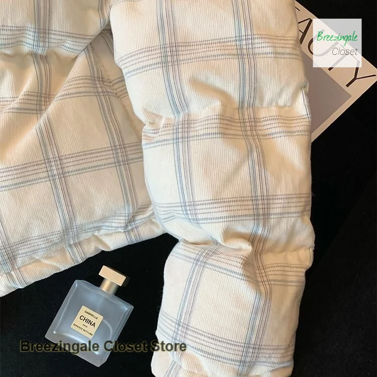 Korean corduroy plaid collar thickened cotton-padded jacket women's autumn and winter new temperament warm casual coat.