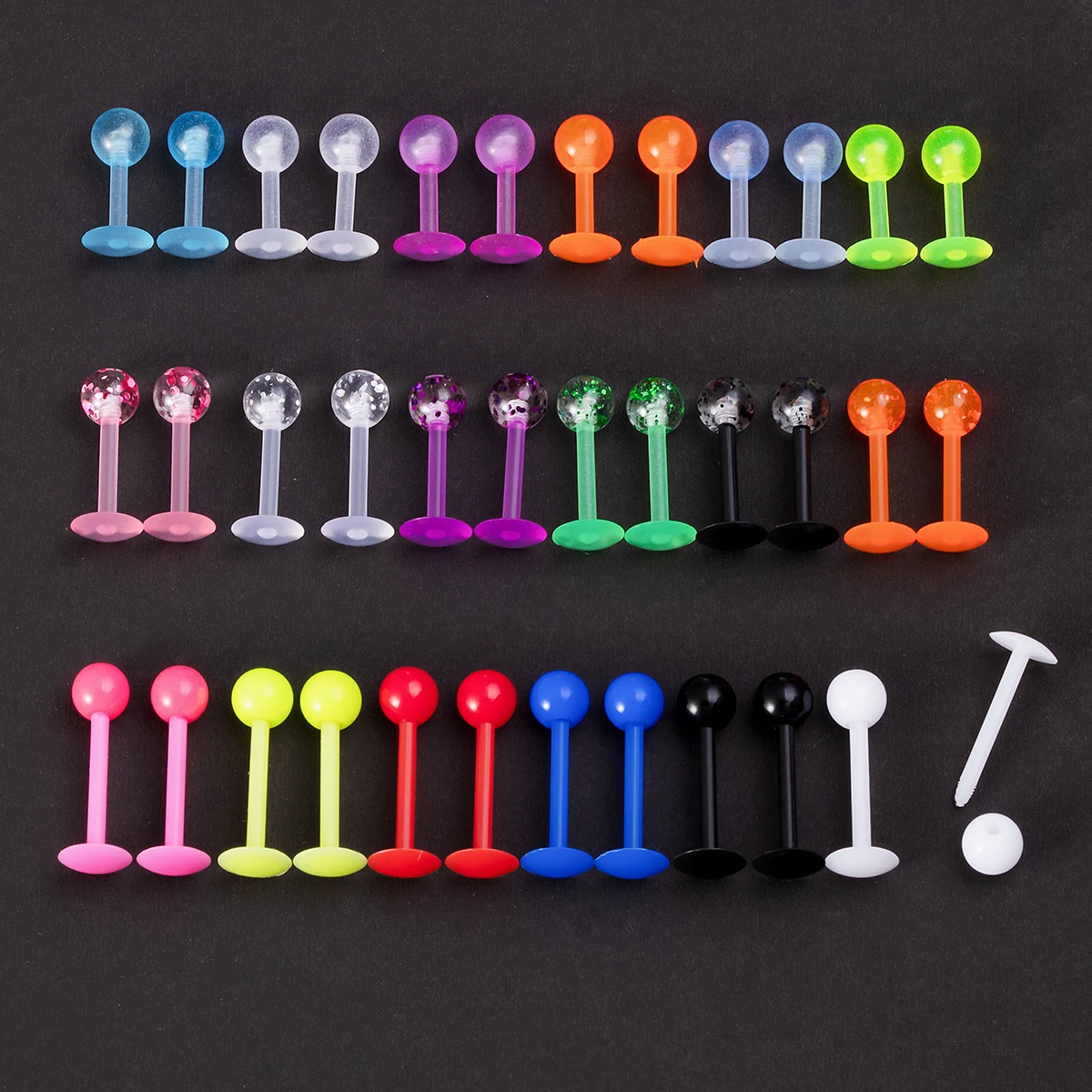 36 piezas de joyería corporal: Pendientes de labio, anillos de nariz, kit de perforación de oreja, piercing de barra flexible que brilla en la oscuridad para lengua y ombligo
