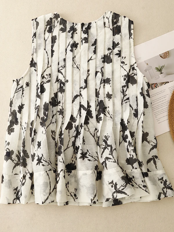 قميص نسائي صيفي جديد 2025 بدون أكمام بياقة دائرية وتصميم فني بالحبر، فضفاض وقصير، يمنح مظهراً نحيفاً، مناسب للارتداء اليومي