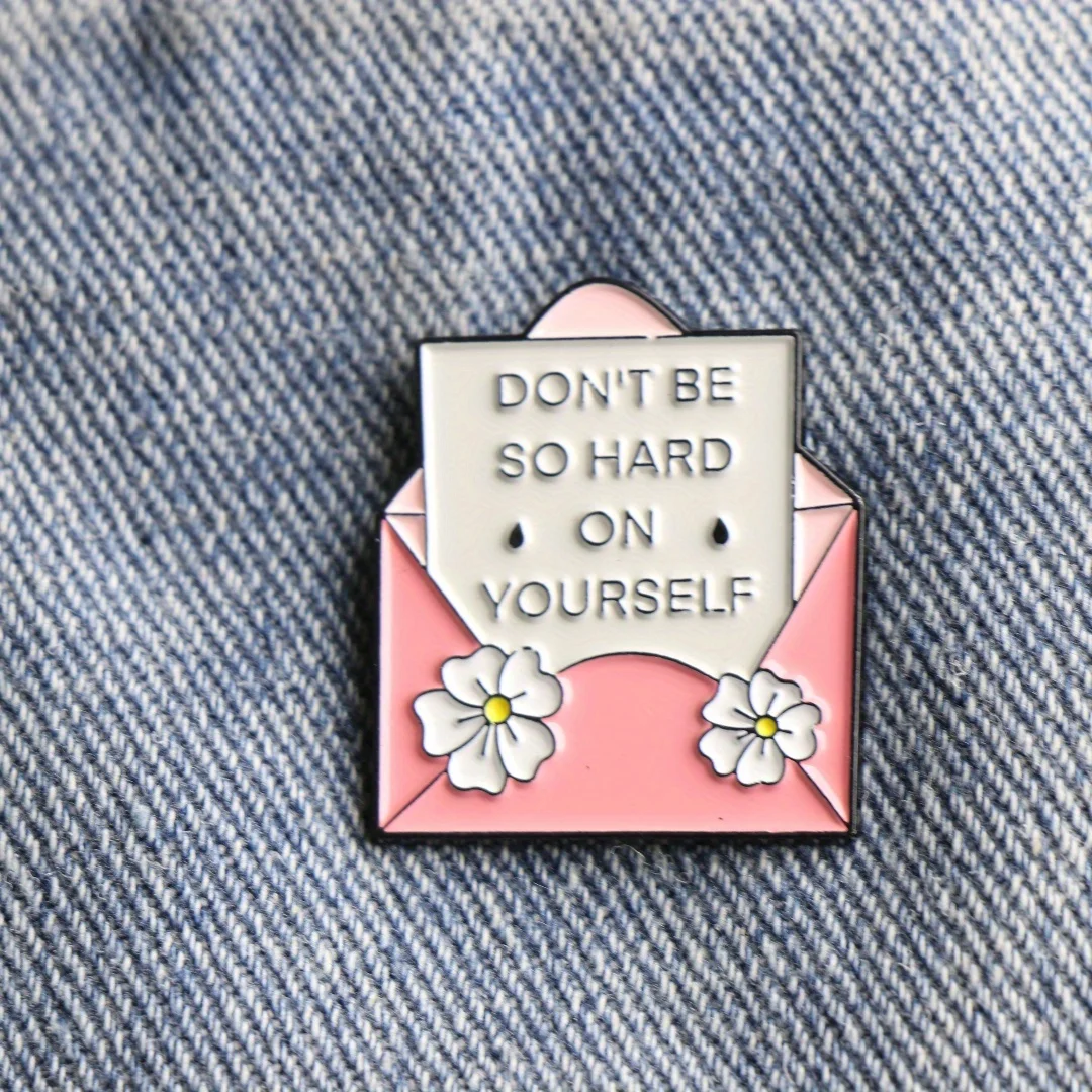 A humorous metal enamel pin with a witty phrase, perfect for accessorizing backpacks and clothes. Makes a great gift for friends