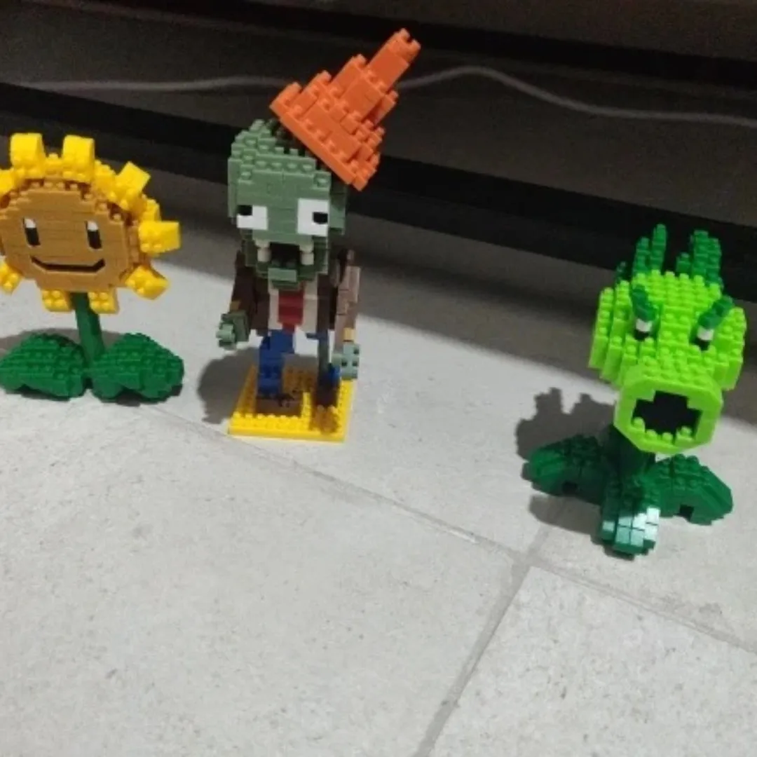 Plants VS Zombies bloques de construcción de dibujos animados pequeños, Mini Peashooter, girasol, Chomper, ensamblar, modelo de acción, muñeca de