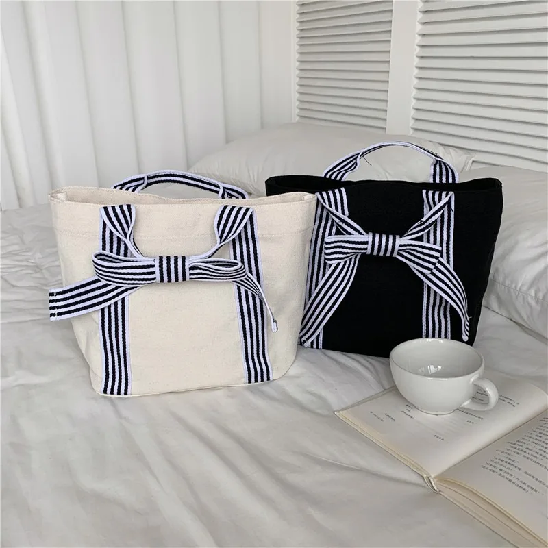 Black Neutral Fashion Simple Women's Bow Canvas Bag Hand Pull Dark Tie Small Fresh Hand Handbag A Bag view 4