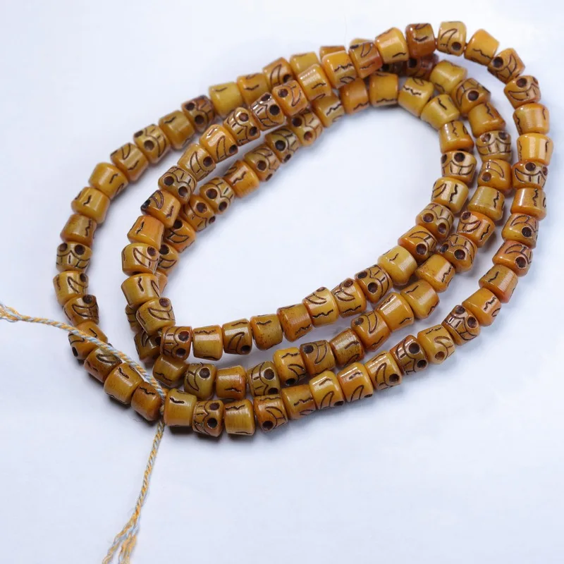 Old yak bone carving of a skull, 108 Buddhist , long string of prayer beads