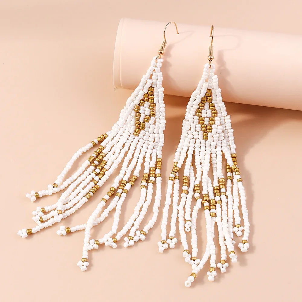 

Fringed earrings Hand woven fashion Versatile Simplicity Bohemia Beading female alloy Rice bead earrings