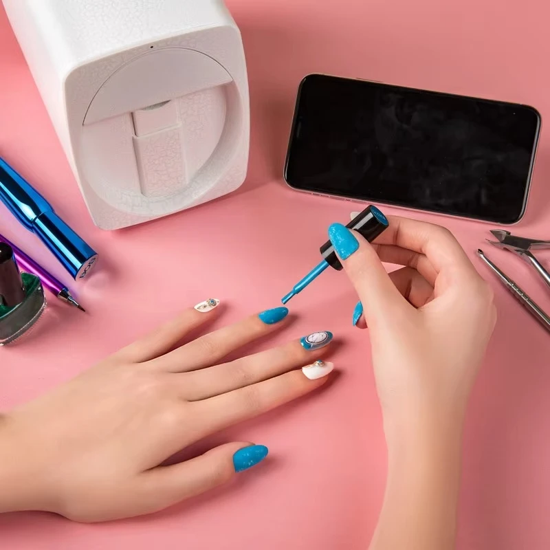 O2Nails M1 آلة طلاء الأظافر الاحترافية الصغيرة المحمولة التلقائية ثلاثية الأبعاد التكنولوجيا الطاقة الكهربائية الخدمة الذاتية مسمار واي فاي