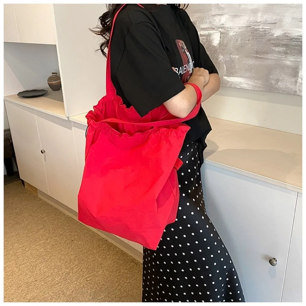 Fashionable Versatile Bucket Bag Pure Color Large Capacity Crossbody Bag Drawstring Closure Nylon Shoulder Bag for Women