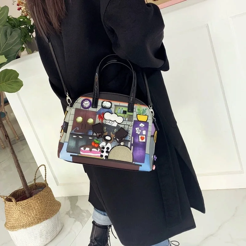 2024 New Fashionable Cartoon Printed Color blocked Shell Handbag Versatile Single Shoulder Crossbody Bag hand bag ladies designe