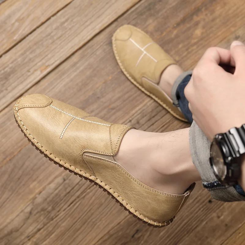 ربيع جديد أحذية للرجال أحذية جلدية عادية أحذية مسطحة موضة موجزة الانزلاق على المتسكعون