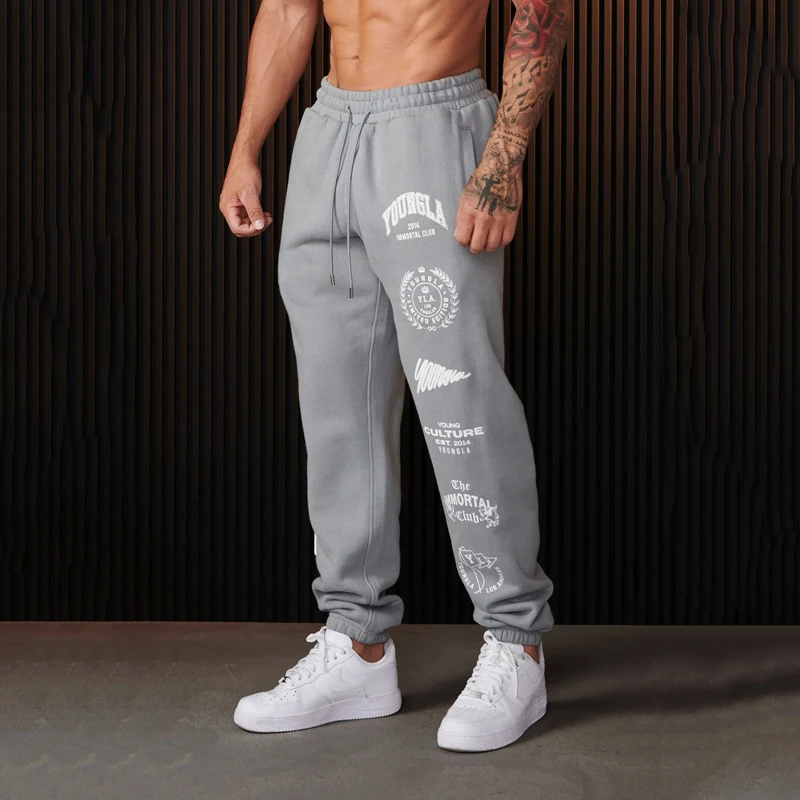 New style  Men Sweatpants Spring Autumn Leisure walk Sports Fitness Cotton Printed Pants Mid Waist Drawstring Pants Body shaping