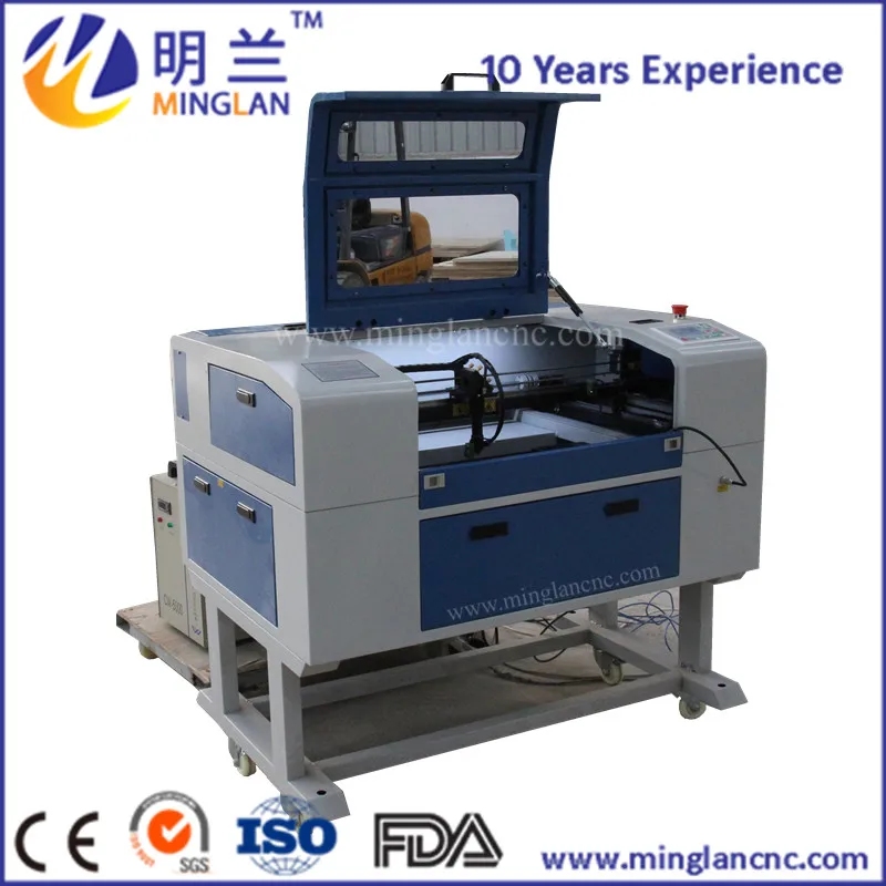 Macchina da taglio laser co2 per legno, MDF, acrilico, metallo e pietra/prezzo macchina per incisione laser/macchina da taglio laser 1390 1610