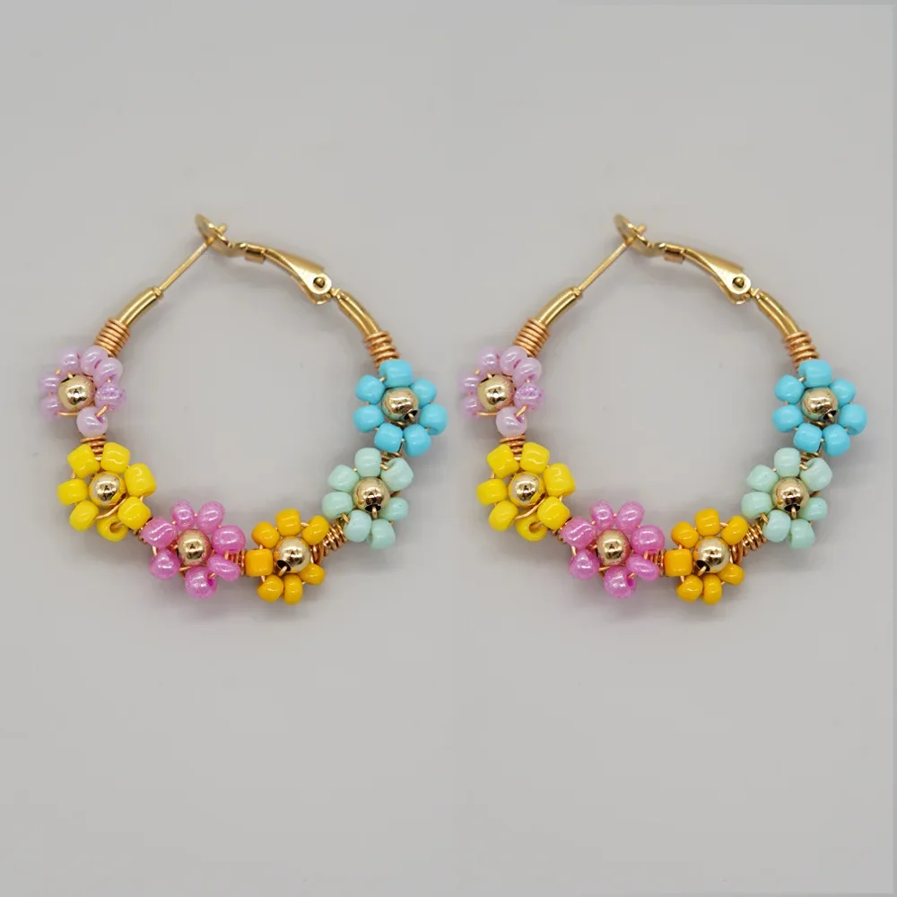 Beaded earrings Flower shape Circle Originality Hand knitting Bohemia Alloy Tide Simple Graph Rice bead earrings