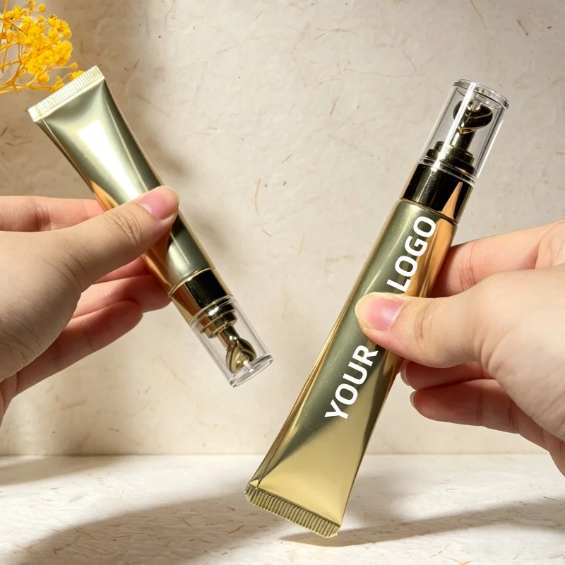 

【Logo Custom】50Pcs Luxury 15/20ml Gold Cosmetic Plastic Tube Heart Shaped Massage Head Eye Cream for Essence Essential Oil Tube
