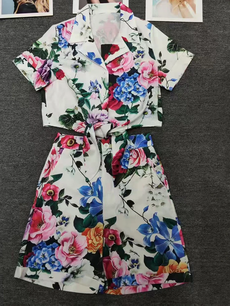 

Spring and summer 2025 new printed single-breasted short-sleeved lace-up shirt high waist shorts fashion two-piece women's suit