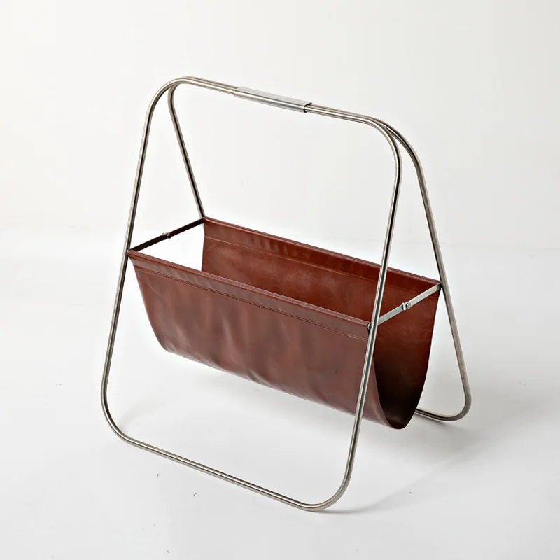 

Nordic stainless steel leather book and newspaper rack floor storage shelf household