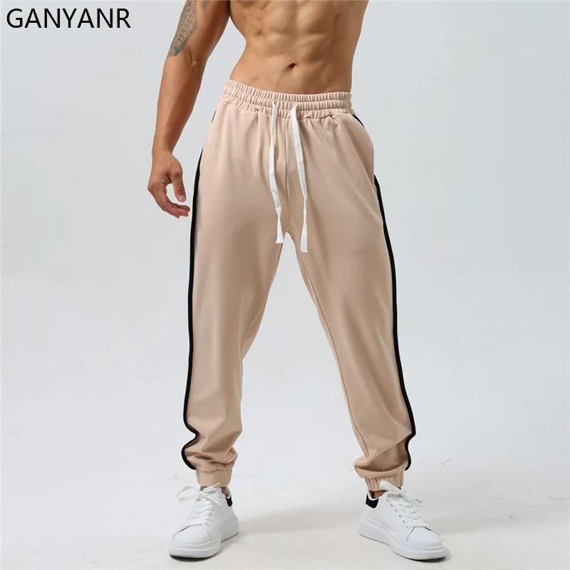 GANYANR Running Pants Men Leggings Pockets gym Sports basketball Sweatpants fitness trousers Sportswear Training Jogger workout