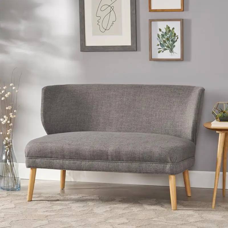 Wygodny fotel dwuosobowy do przytulnego salonu, stylowy design i trwała tkanina, idealny do małych przestrzeni.