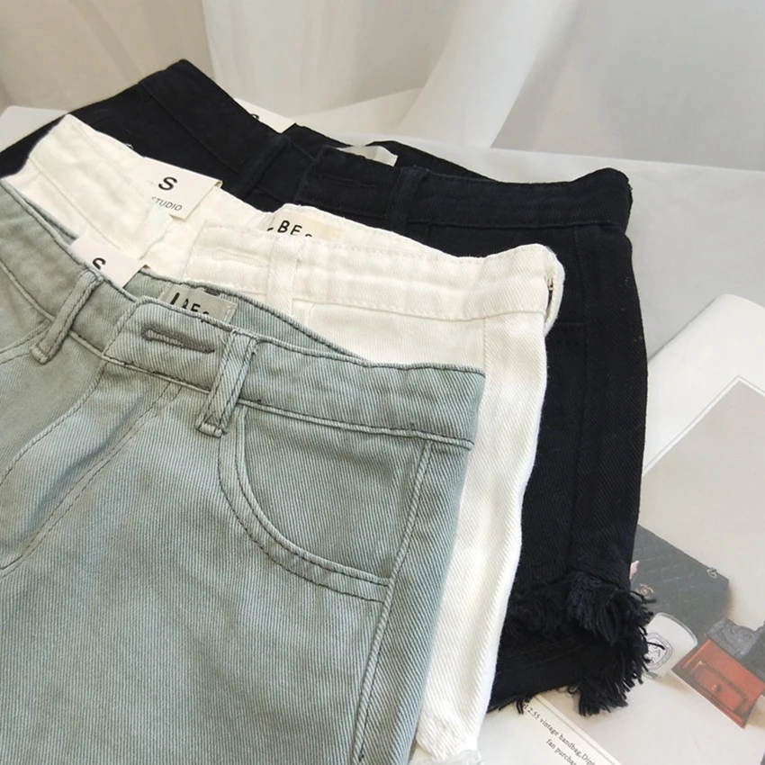 Pantaloncini di jeans estivi da donna Pantaloncini con frange tinta unita a vita alta Jeans corti femminili di base alla moda retrò americana