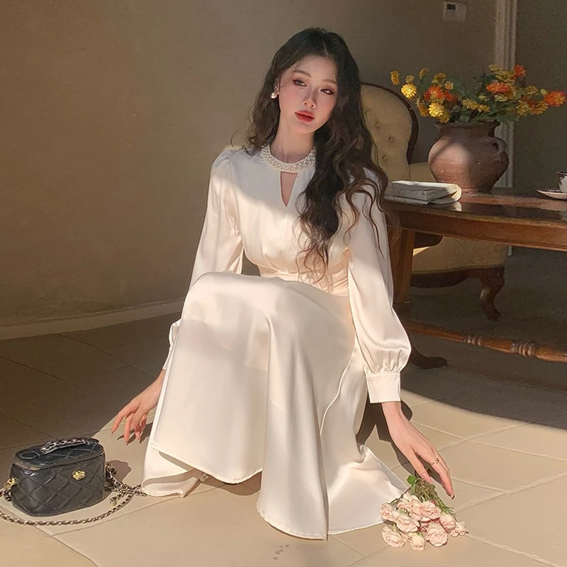 Sukienka z długim rękawem na wiosnę 2025, elegancka, wysokiej jakości, z satyny octanowej, podkreślająca talię, model 5602