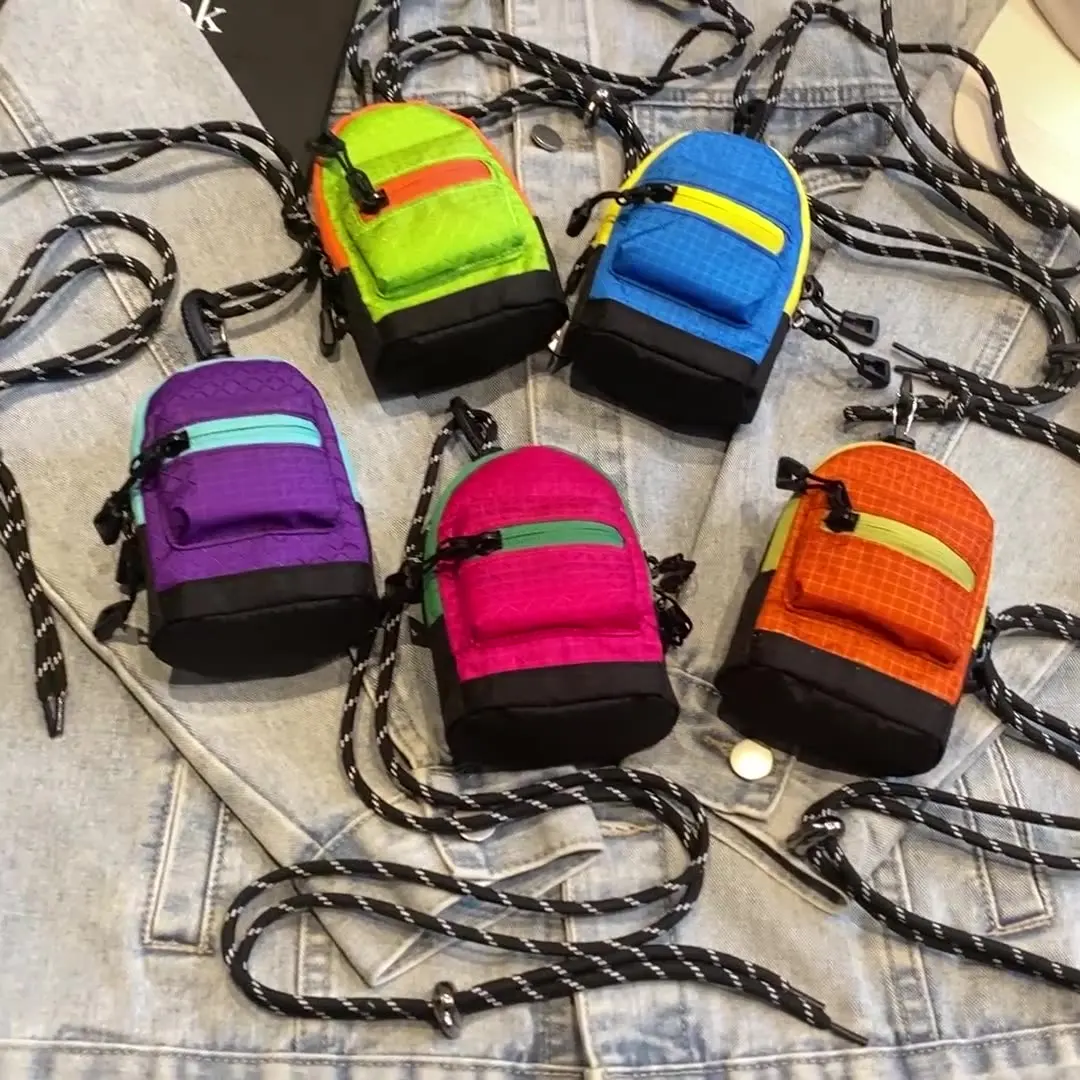 حقيبة كتلة الألوان الصغيرة حبال Ins العصرية Crossbody الرقبة الحقيبة لمفاتيح المحفظة Airpods للجنسين حقيبة الصدر للأنشطة الخارجية