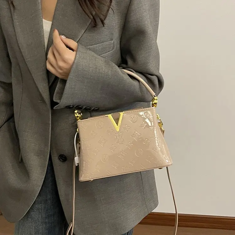 

Vintage Flap Crossbody, Compact Square Shape, Interior Compartments, Polished Buckle Accent, Day-to-Night, New 2026