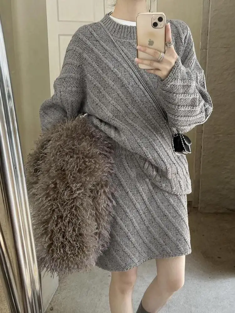 Francês outono inverno feminino sólido elegante em torno do pescoço manga comprida camisola curta malha topos e cintura alta mini saia conjunto de duas peças