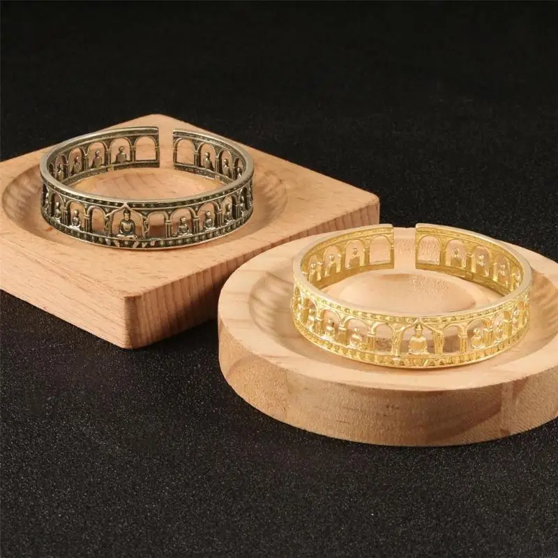  Fashionable Open End Bangle Accessory Showcasing Intricate Buddhist Artwork