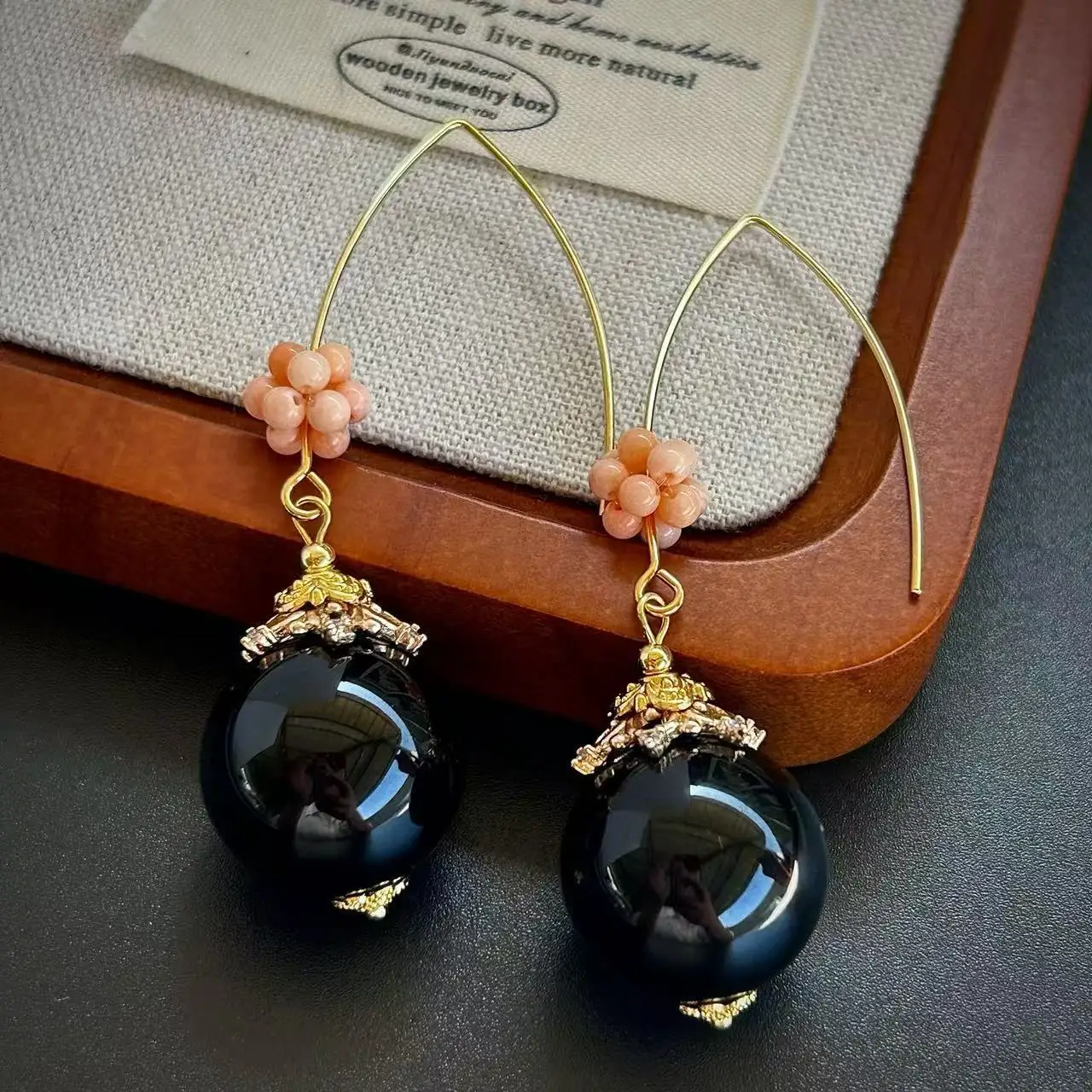 Hanfu retro sea bamboo hand-woven flower ball earrings women's zircon high-end 20mm natural black agate earrings
