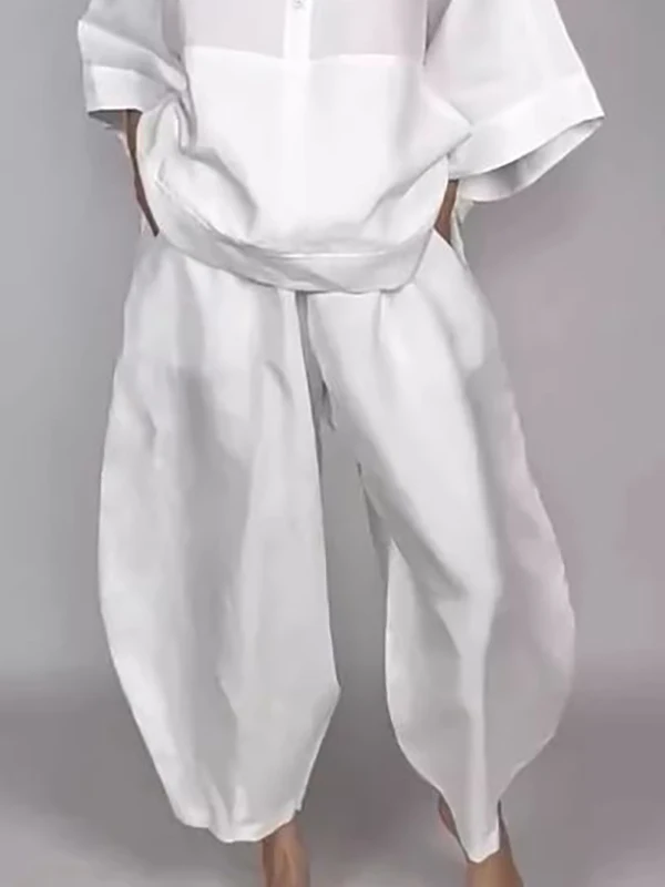 بنطال رياضي صيفي غير رسمي للنساء 2026 ربيعي عالي الخصر بجيوب فضفاض بلون سادة بخصر مطاطي للنساء ملابس