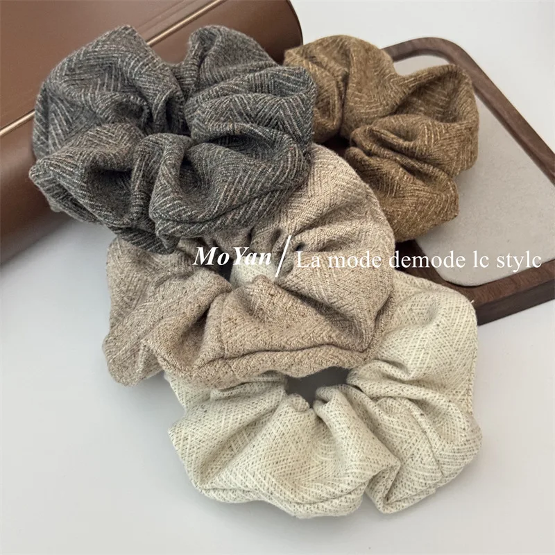 Autumn and winter premium woolen large intestine hair band 2024 new ball head rubber bands hair rope low ponytail headrope