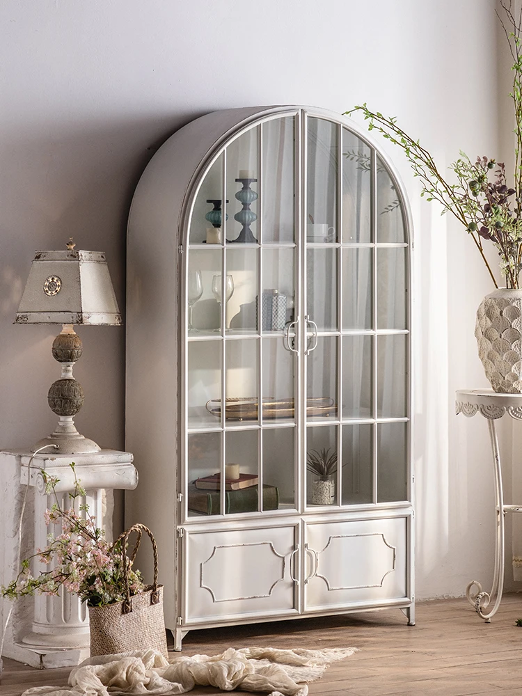 The product can be customized.French retro wrought iron bookcase with glass door arched living room white simple bookshelf