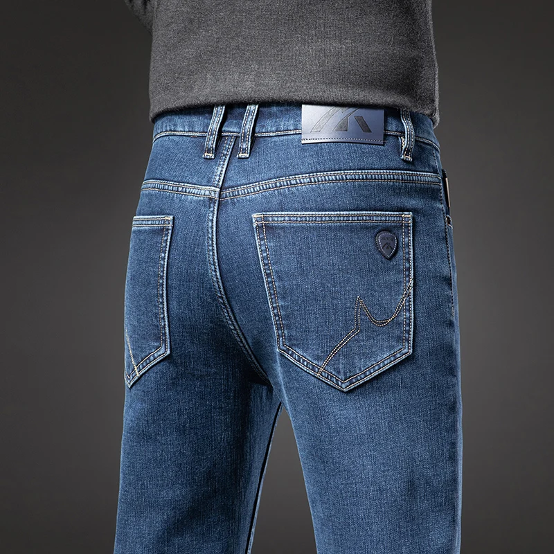 冬のメンズフリース暖かいジーンズファッション弾性ストレートビジネスカジュアルダークブルーデニムパンツ肥厚ぬいぐるみベルベットズボン