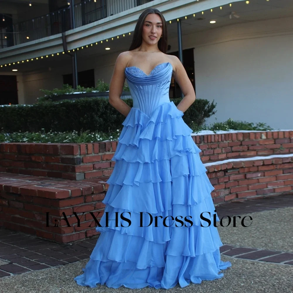 ชุดราตรีแฟชั่น LAYXHS สีฟ้า ทรงหวาน แบบเอไลน์ ระบายชั้นๆ ยาวกรอมพื้น ชุดออกงานพรอม สามารถสั่งตัดได้