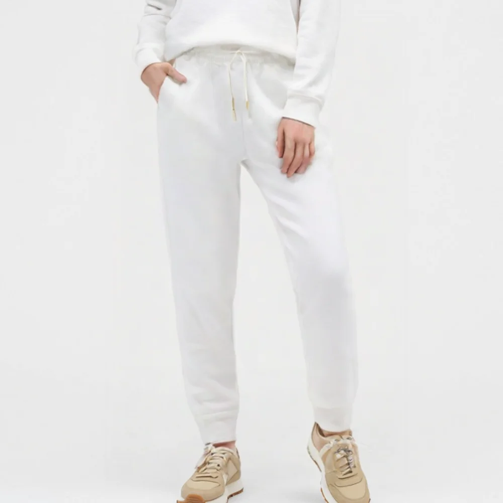 

New Taop&Za Women's White Drawstring Jogger Pants with Ankle Zippers Stylish and Comfortable for Daily Life