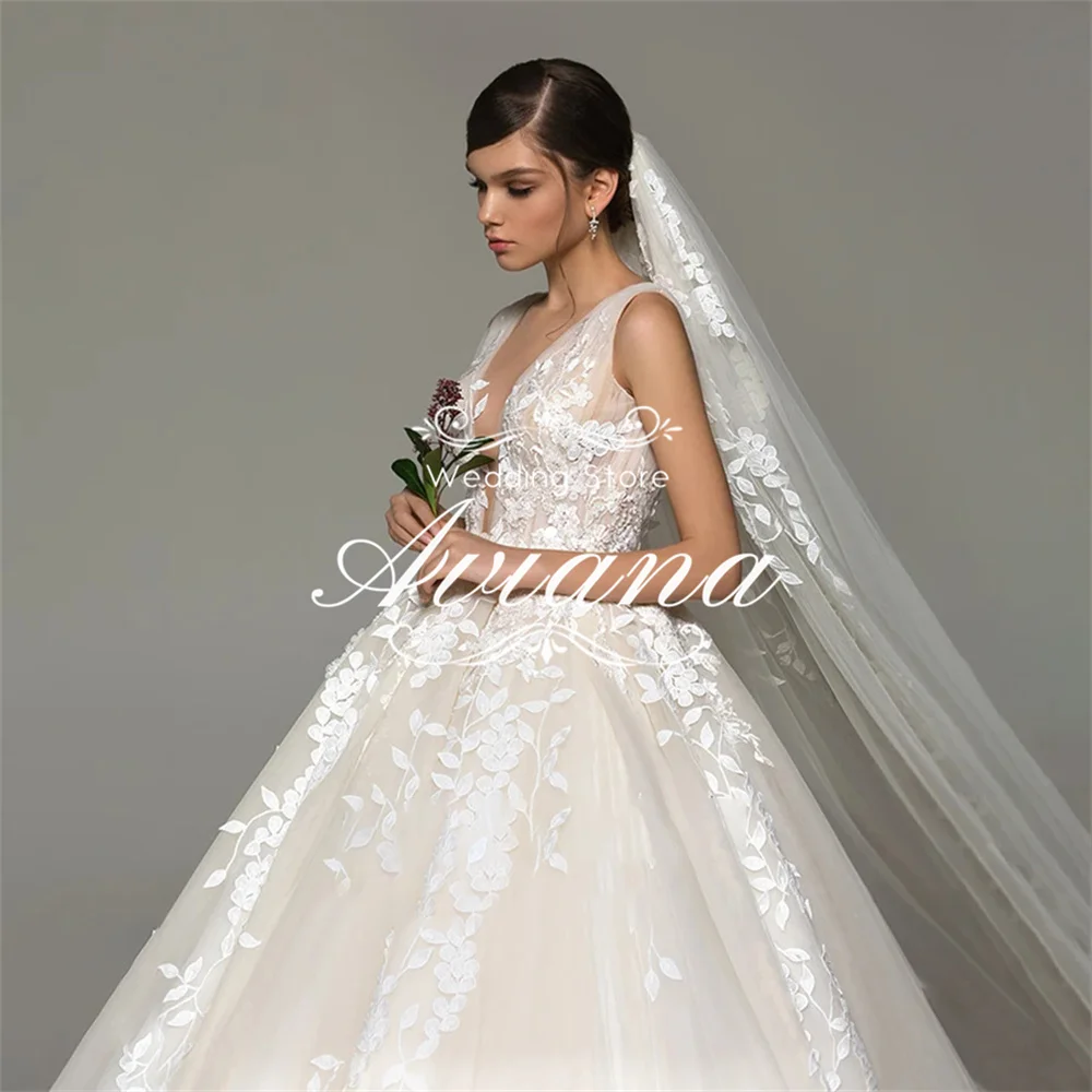 Aviana Aangepaste A-lijn Kant Bloemenborduurwerk Diepe V-hals Trouwjurk Ruglooze Mouwloos Elegant Charmant Applicaties 2025