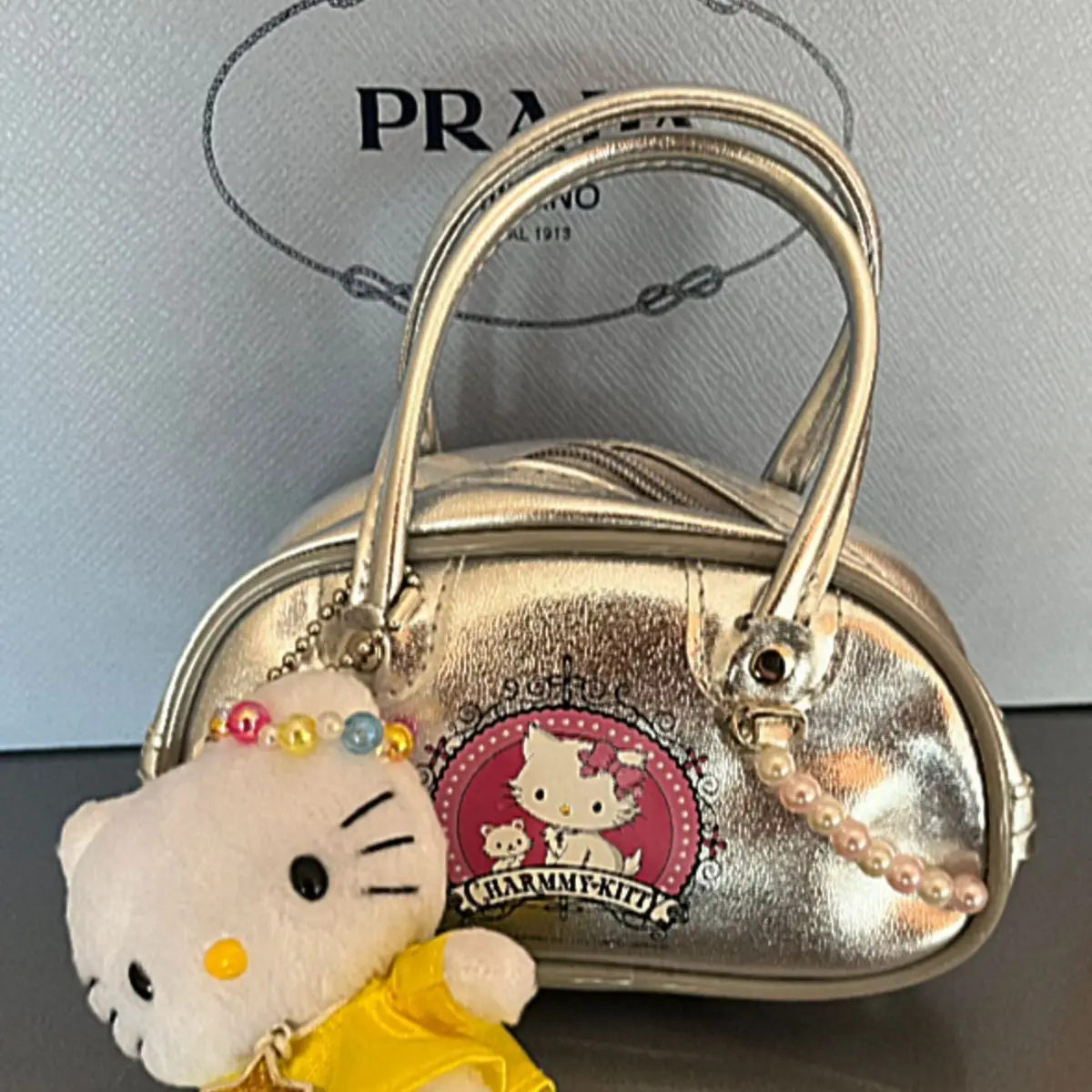 กระเป๋าถือ minio Hello Kitty กระเป๋าใต้วงแขน2023ใหม่ฤดูใบไม้ผลิและฤดูร้อนกระเป๋าสะพายข้างอเนกประสงค์กระเป๋าสะพายไหล่