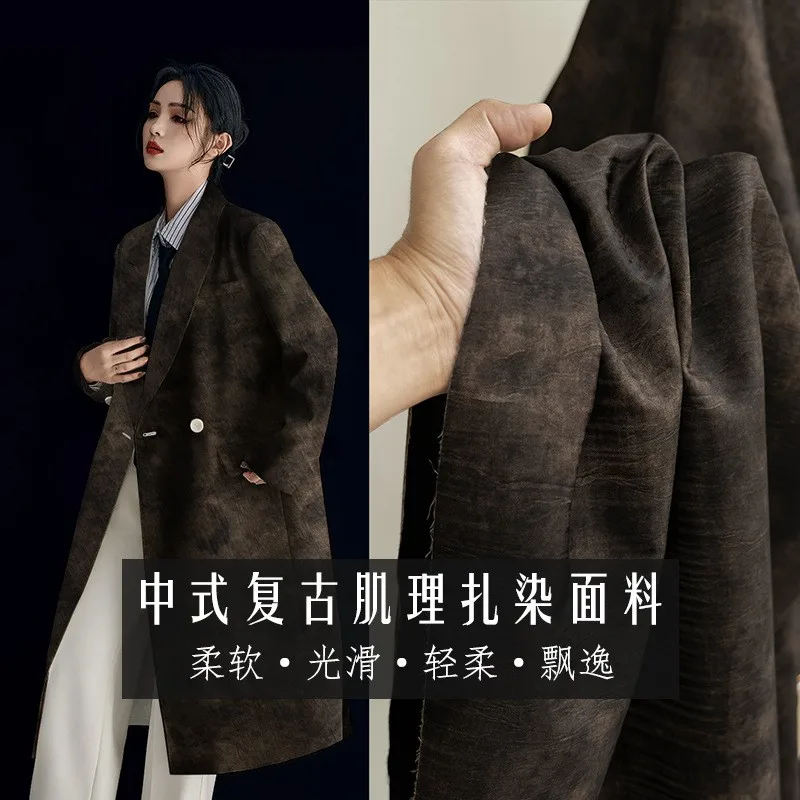 

Black and brown ink-wash tie-dyed pleated suit skirt pants fabric by a fashion designer