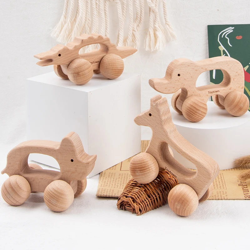 Set di giocattoli a spinta per animali in legno da nove pezzi con coccodrillo, coniglio e altri disegni di animali I bambini hanno esploderà spingendo il c