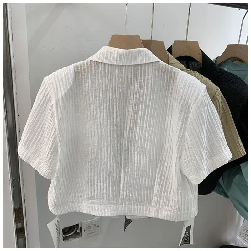 Novedad de verano para mujer, blusas cortas de gasa de Color sólido coreano para ir al trabajo, camisa de mujer con botones de manga corta fruncida de retazos con cuello tipo Polo