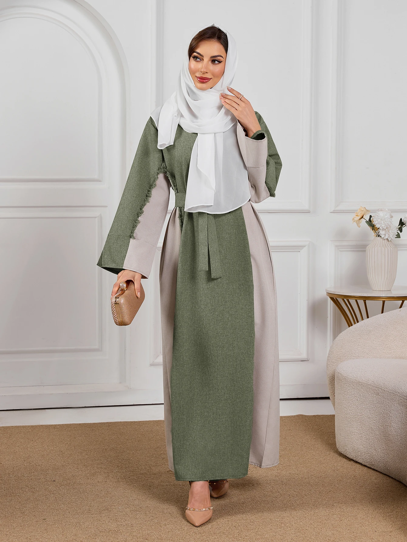 

Green toned Muslim Abaya with Waist Tie Handy Pockets Fresh Stylish Option Women Fashion forward Design for Social Routine Life