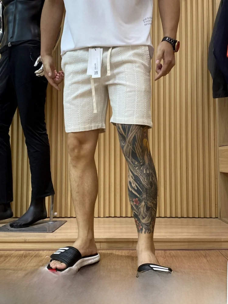 Men's Summer Casual Short Pants Hollow out Embroidery Process Comfortable Breathable Loose Elastic Waist Five-Quarter Length