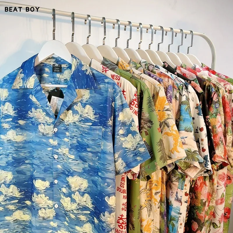 

Summer 2025 Dopane Retro Fun fiti Cuban Collar ort Sve Floral irt Men's Beach Sle Women's Loose Fit Printed P...